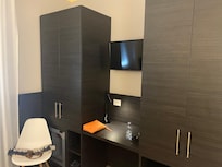 Plenty of wardrobe space and concealed minibar