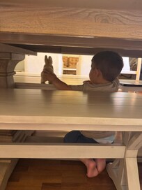 my cute grandson playing under the table