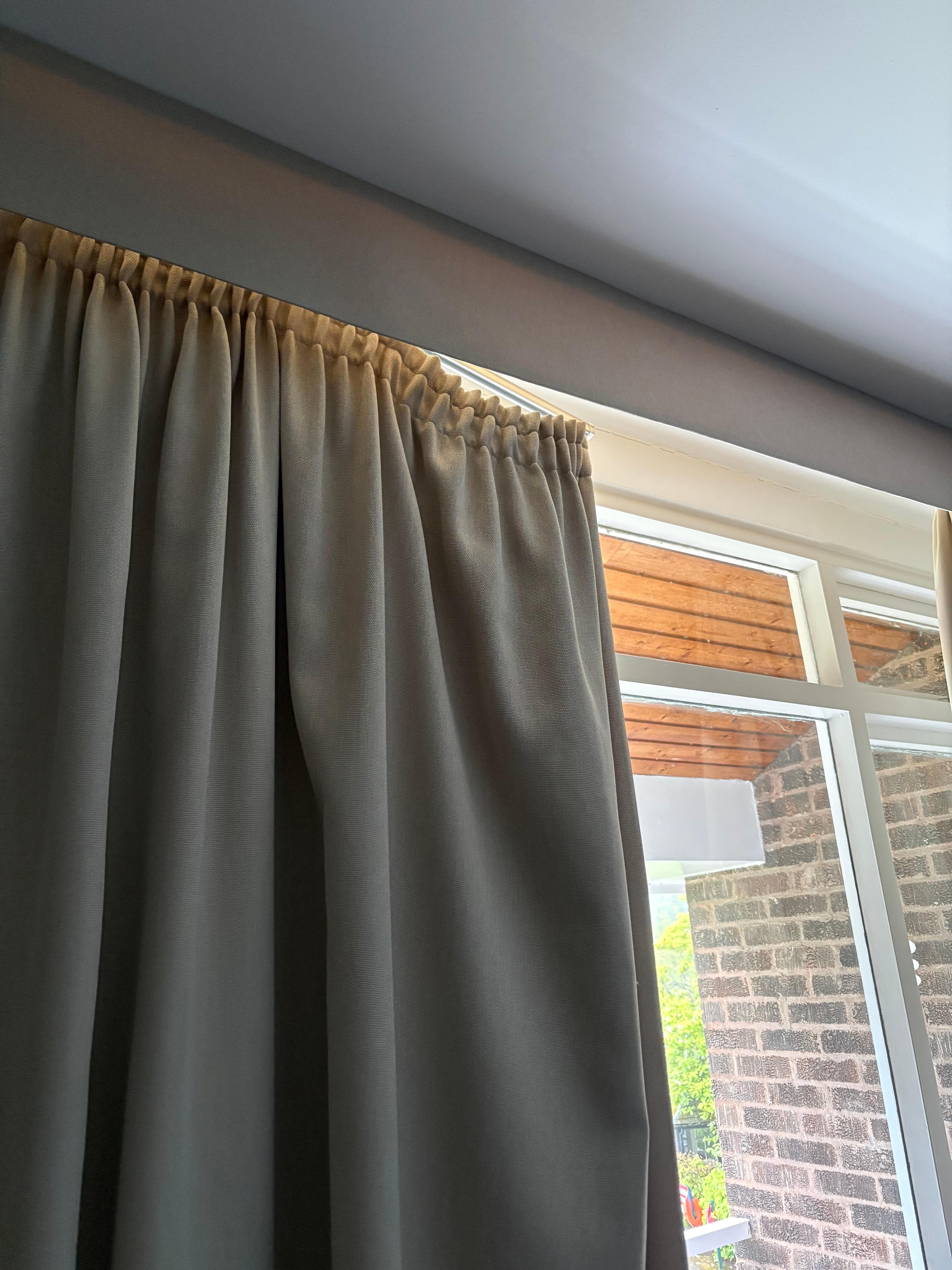 Broken curtain rail.