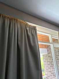 Broken curtain rail.