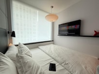 I love the bed by the window. It was easy to connect my phone to the tv. The iPad functions were amazing!