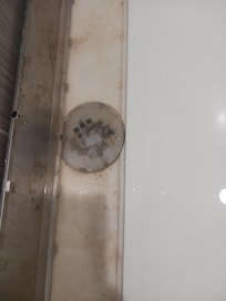 Actual drain condition under stainless steel cover panel.