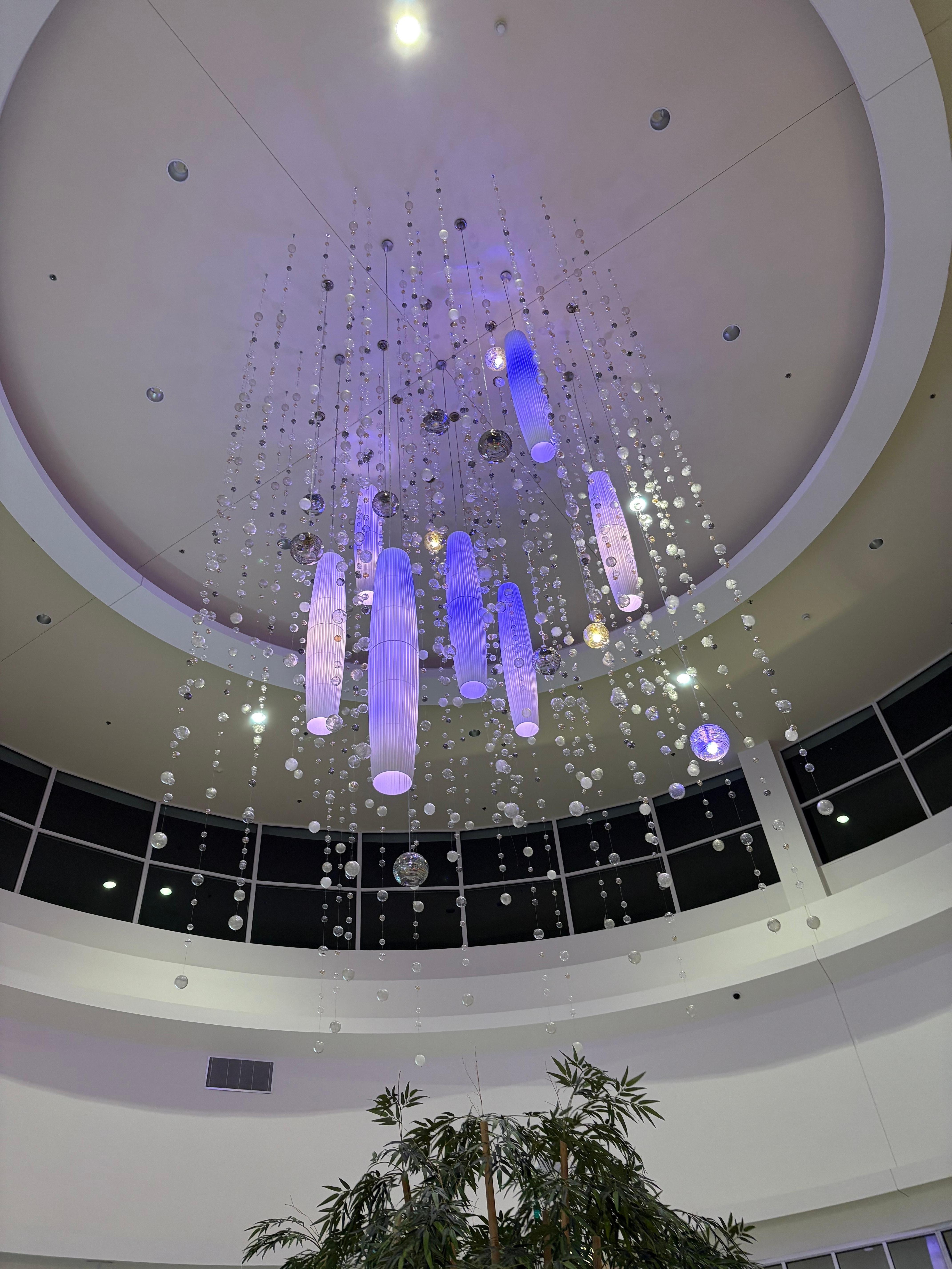 One of the many gorgeous chandeliers throughout.