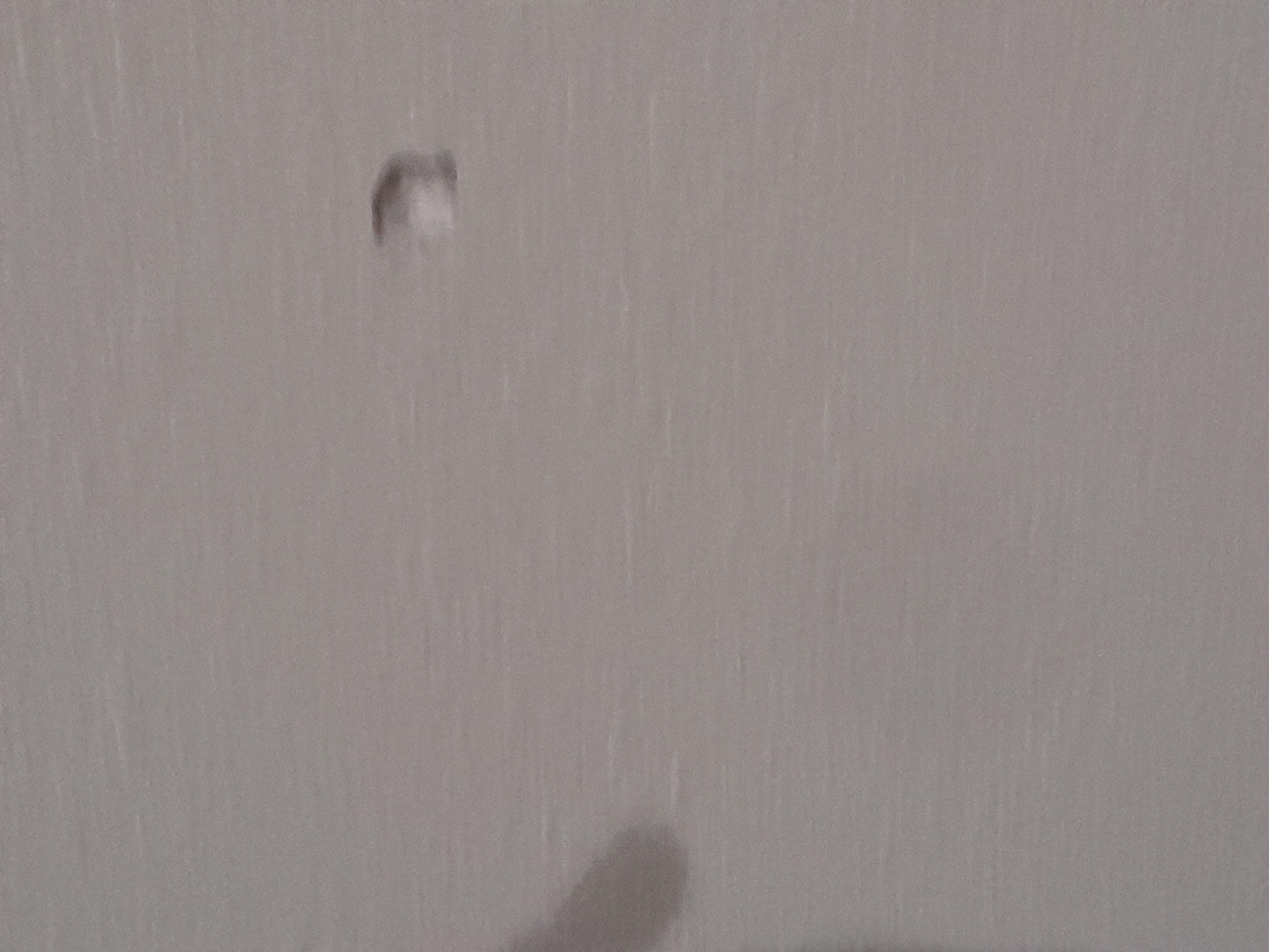 Hole in wall in bathroom 