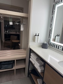 Super neat design can access closet from bathroom to get clothes.