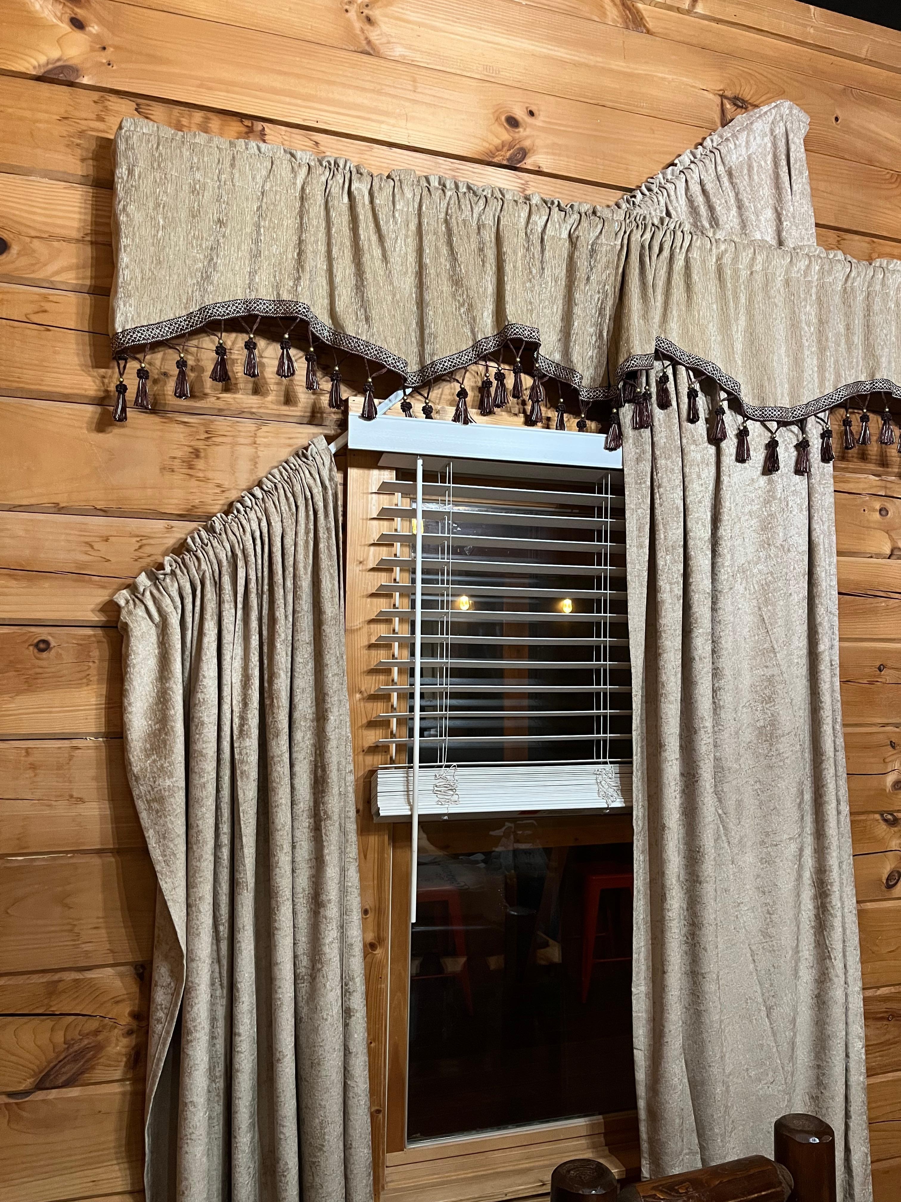 Broken and filthy window treatments throughout.