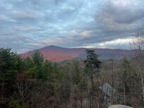 Evening sunset reflecting off mountain.