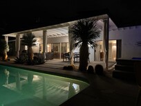Pool and outdoor area at night