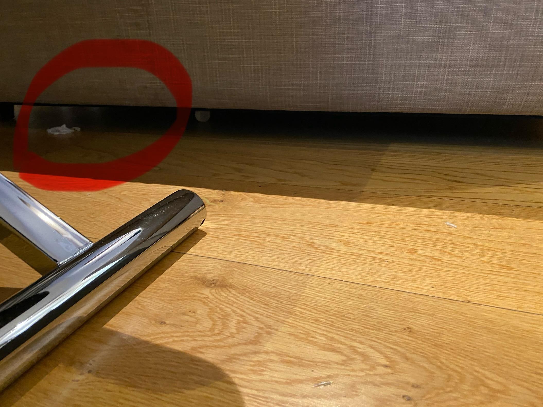 After cleaning, debris/hair was still visibly left on the floor.