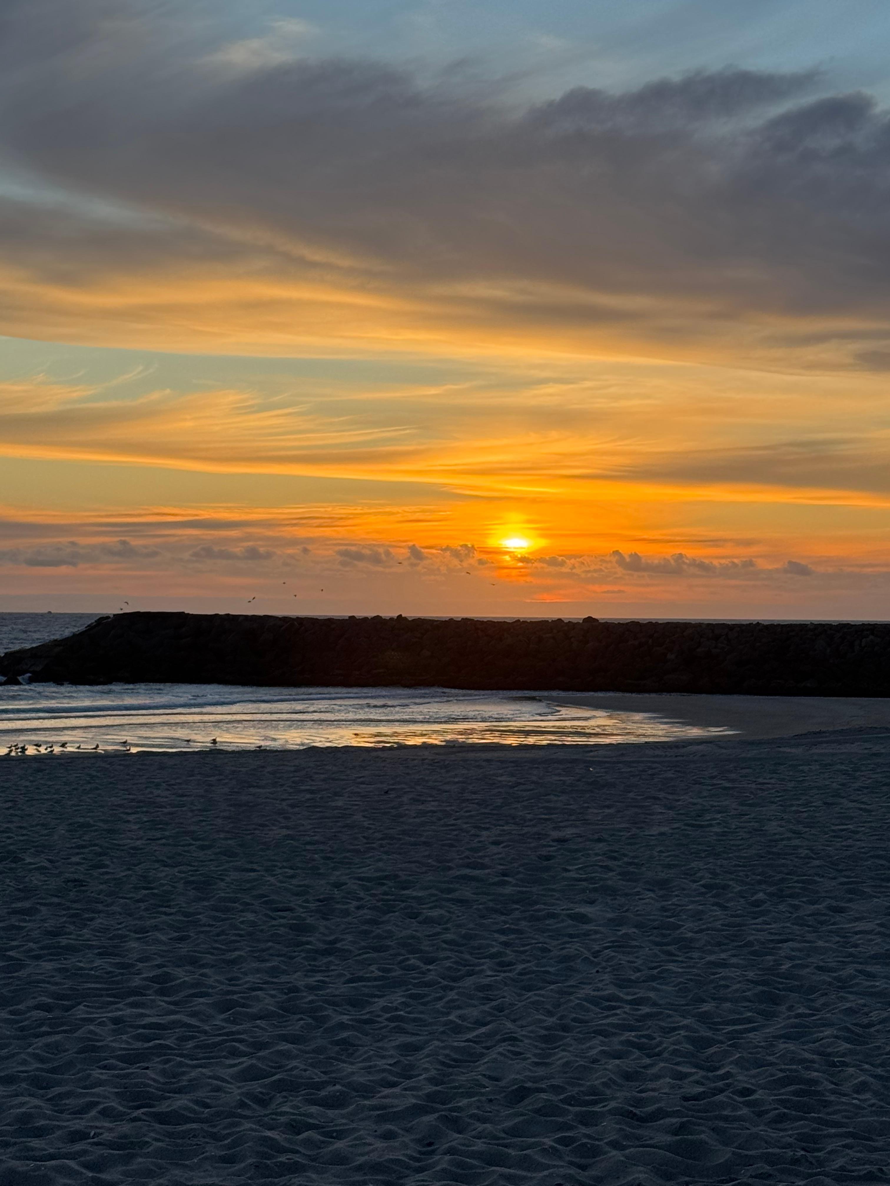 Sunset from beach just steps from beach.