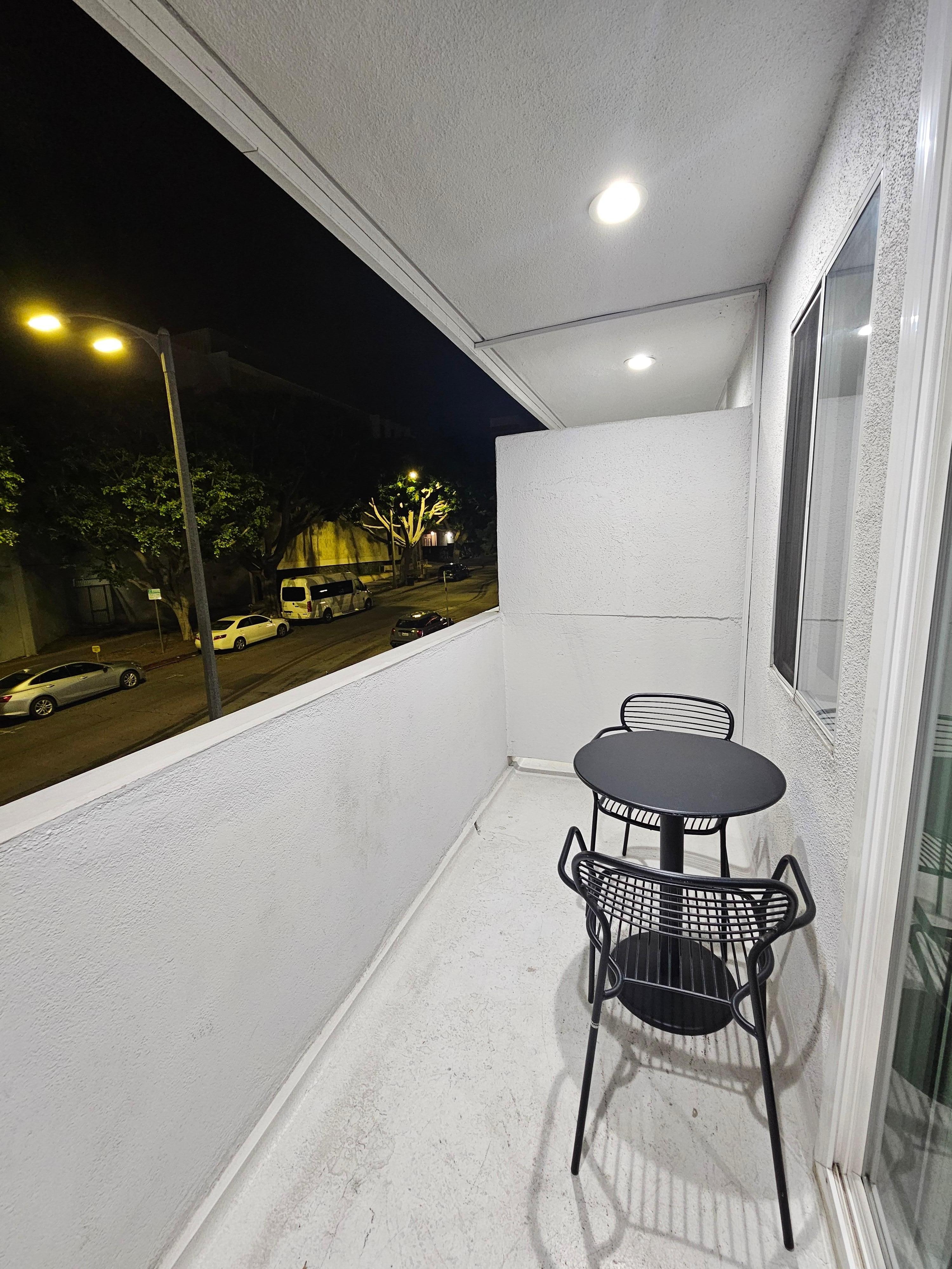 Outdoor furniture on balcony.