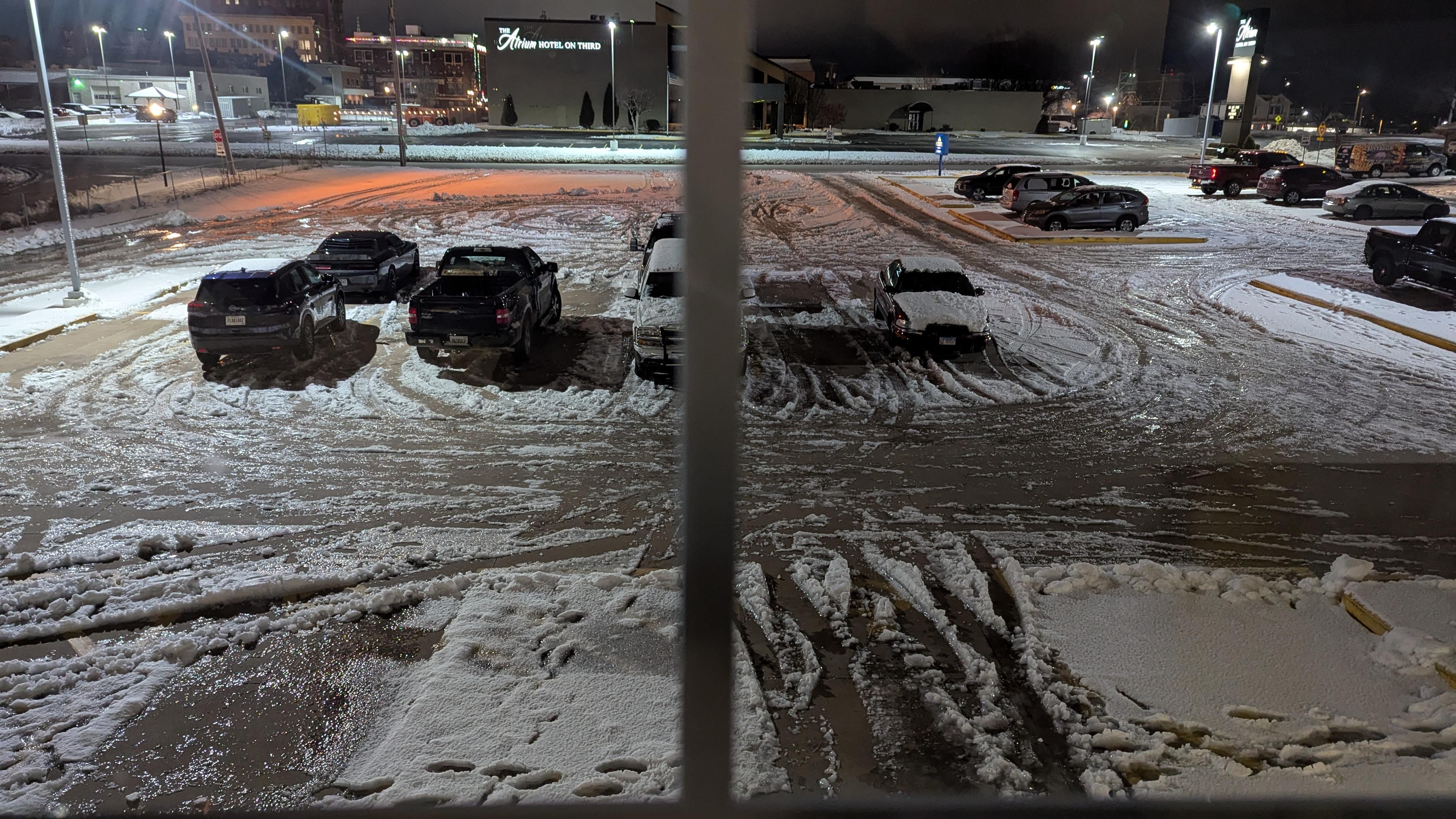 This is a picture of the un-maintained parking lot after the snow storm. Note that the handicap parking spots and areas around them were not plowed at all. Very dangerous 