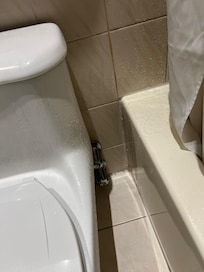 Shower curtain wouldn't stay up on ends so fell to middle and water leaked all over floor/toilet