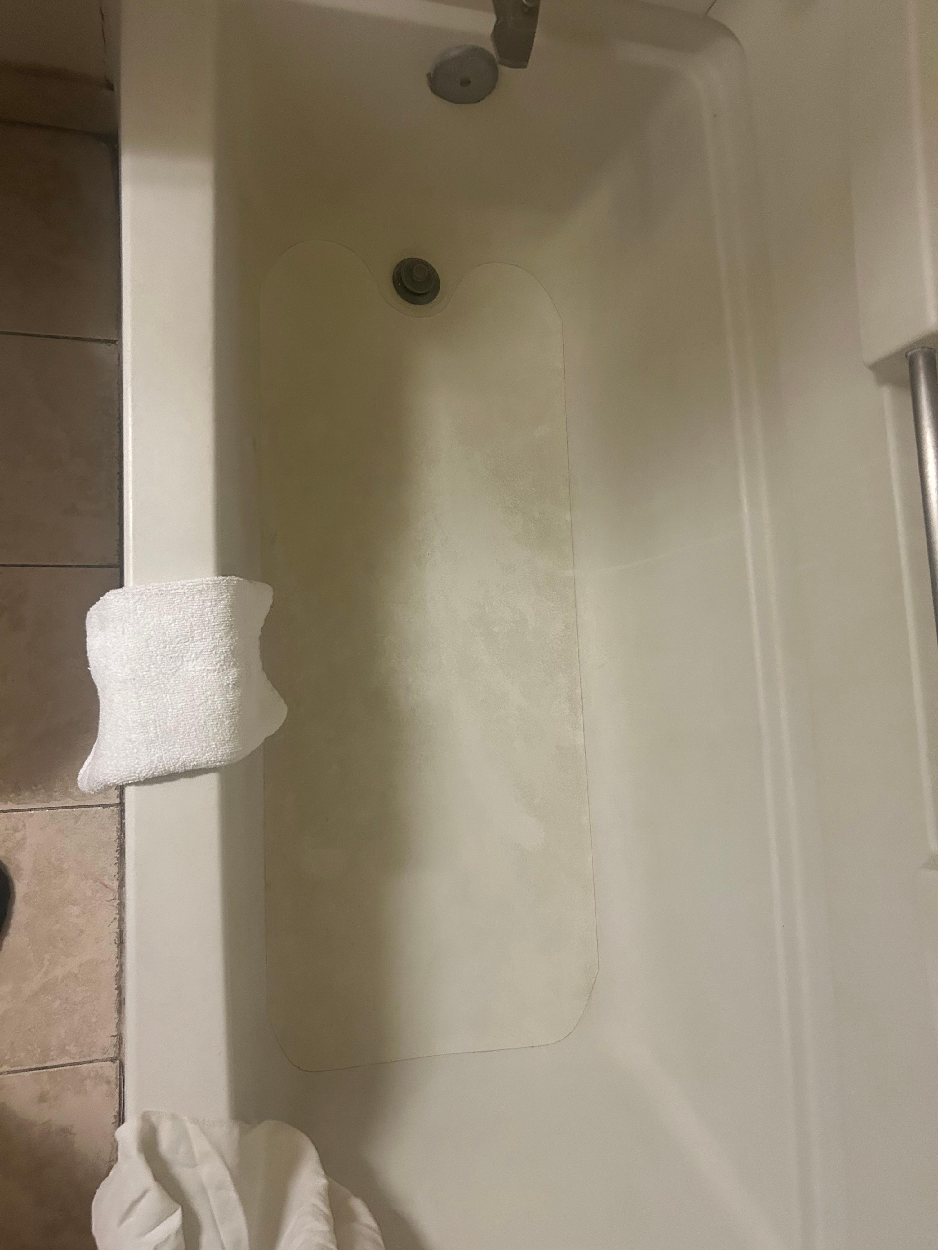 Dirt stained bath tub