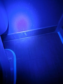 Looks like pee on walls by toilet.