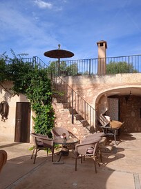 Dettaglio del giardino dove si fa colazione