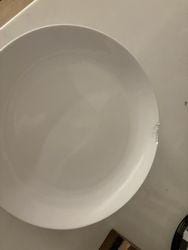 Chipped plate just to show that this has not been changed out....not a new chip  The whole kitchen reflected this.  Scissors dont even open to cut....we bought MANY new kitchen utensils