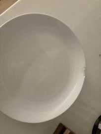 Chipped plate just to show that this has not been changed out....not a new chip The whole kitchen reflected this. Scissors dont even open to cut....we bought MANY new kitchen utensils