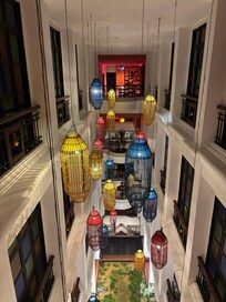 In the hotel hallway upstairs