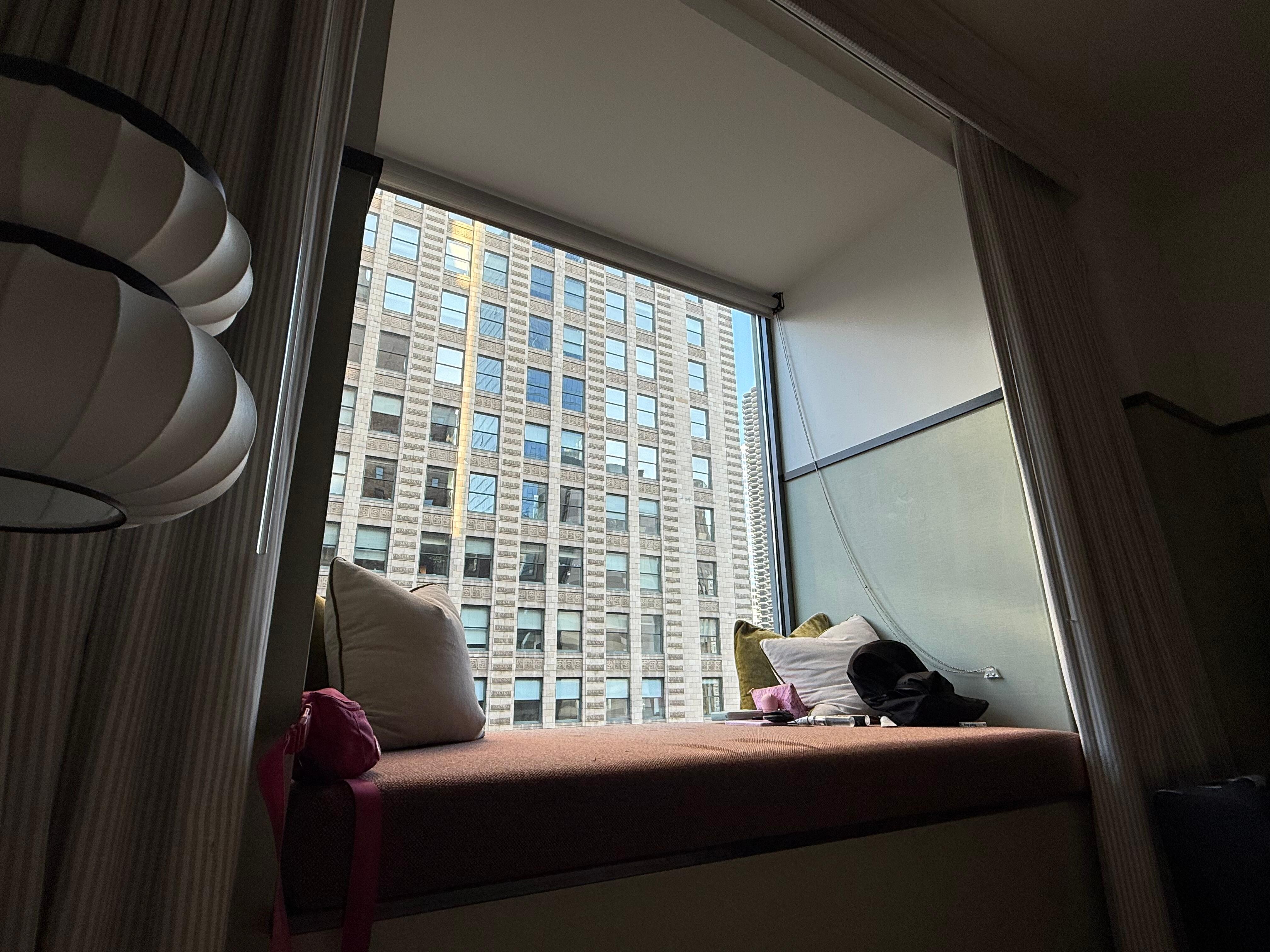 Our little nook on the window. Great to watch the world move and read. 