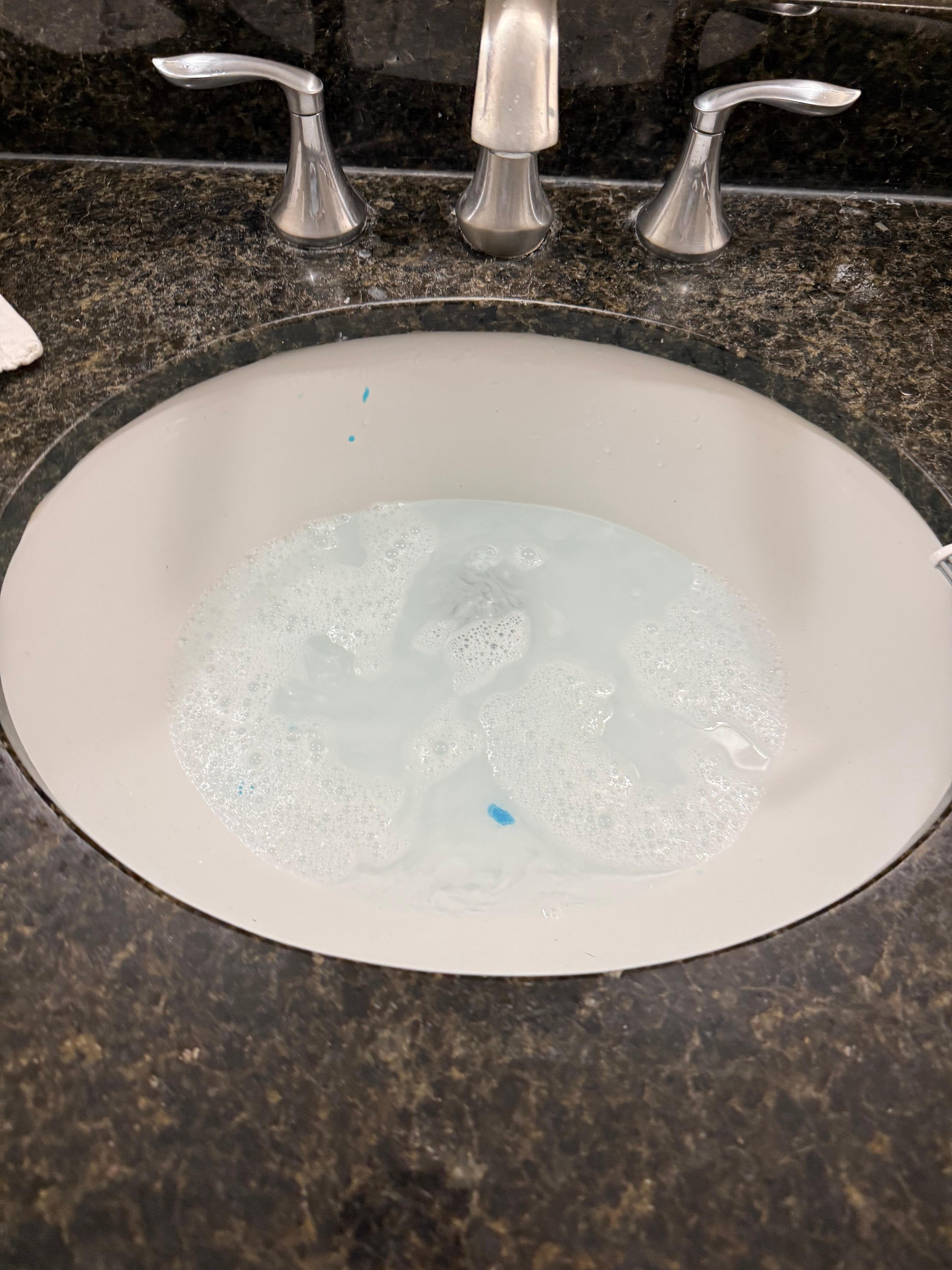 Soap scum all over counters and clogged/slow draining sink 