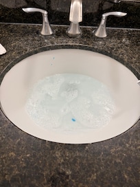 Soap scum all over counters and clogged/slow draining sink