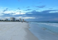 Single home rentals keep beach sunsets tranquil.