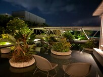 Charming pool side in the evening - quite Romantic.