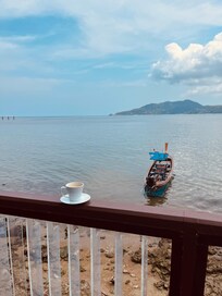 Drinking a latte from the restaurant area.