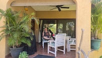Back porch next to pool.
