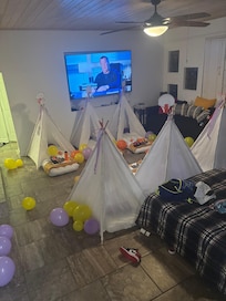 Teepee tent setup in the kids room.