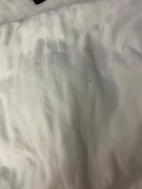 Hair and stain on bedding