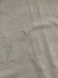 Hair waded in towel not ours