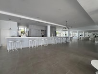 The indoor/outdoor bar .. always ready to provide service with a smile!