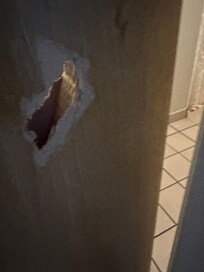 Hole in bathroom door