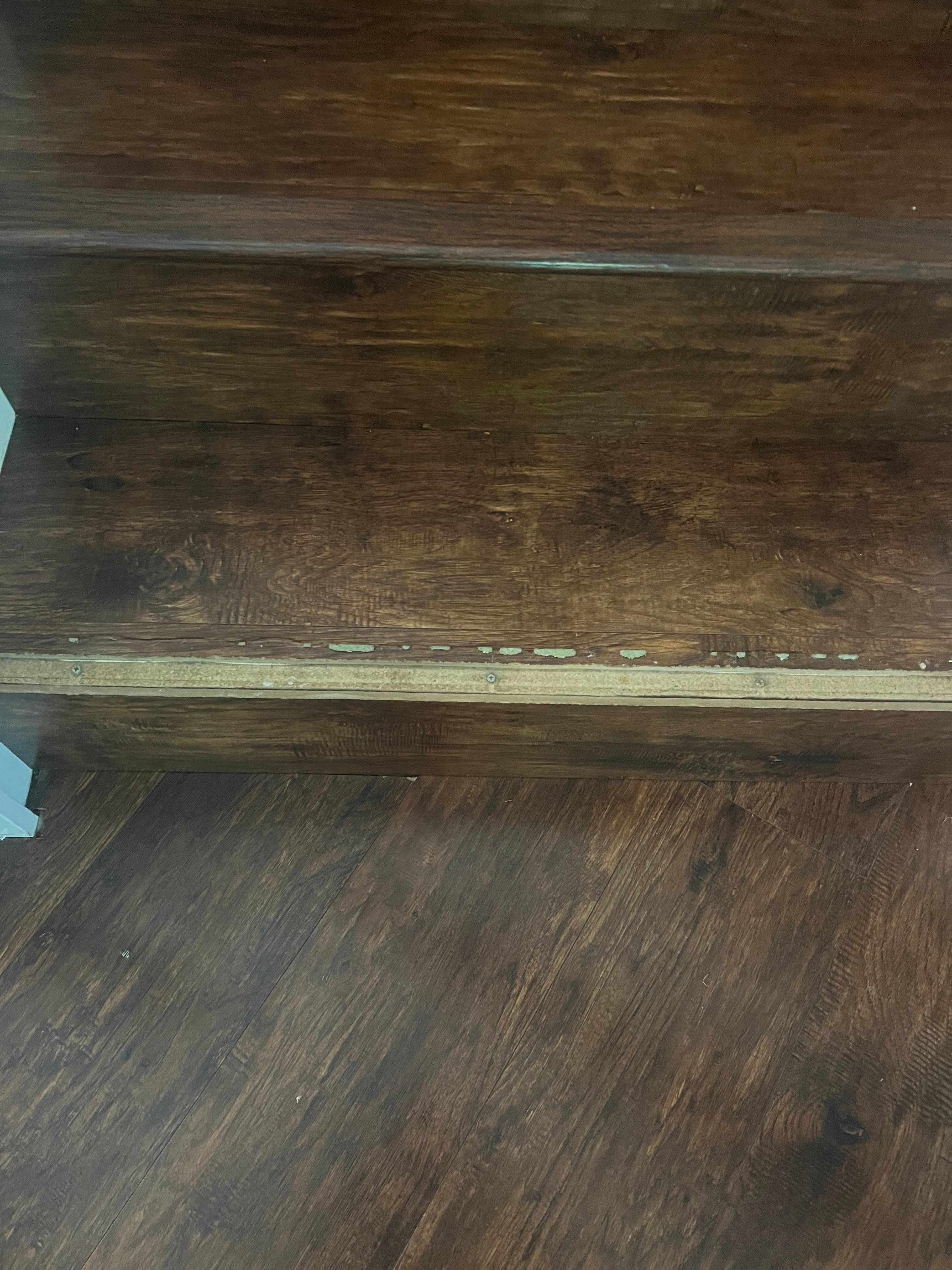 Trim strip missing from step - tripping hazard