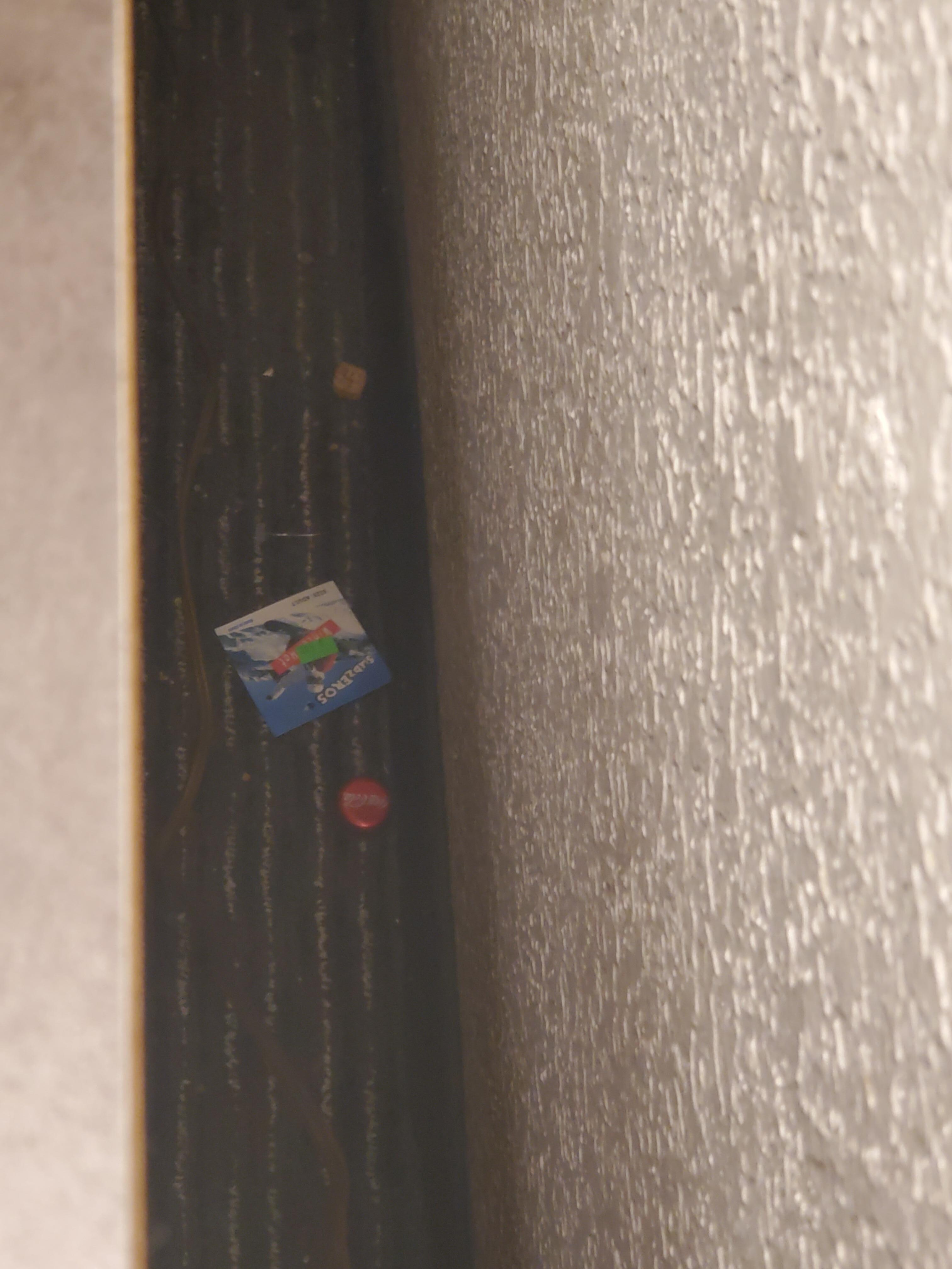 Behind dresser