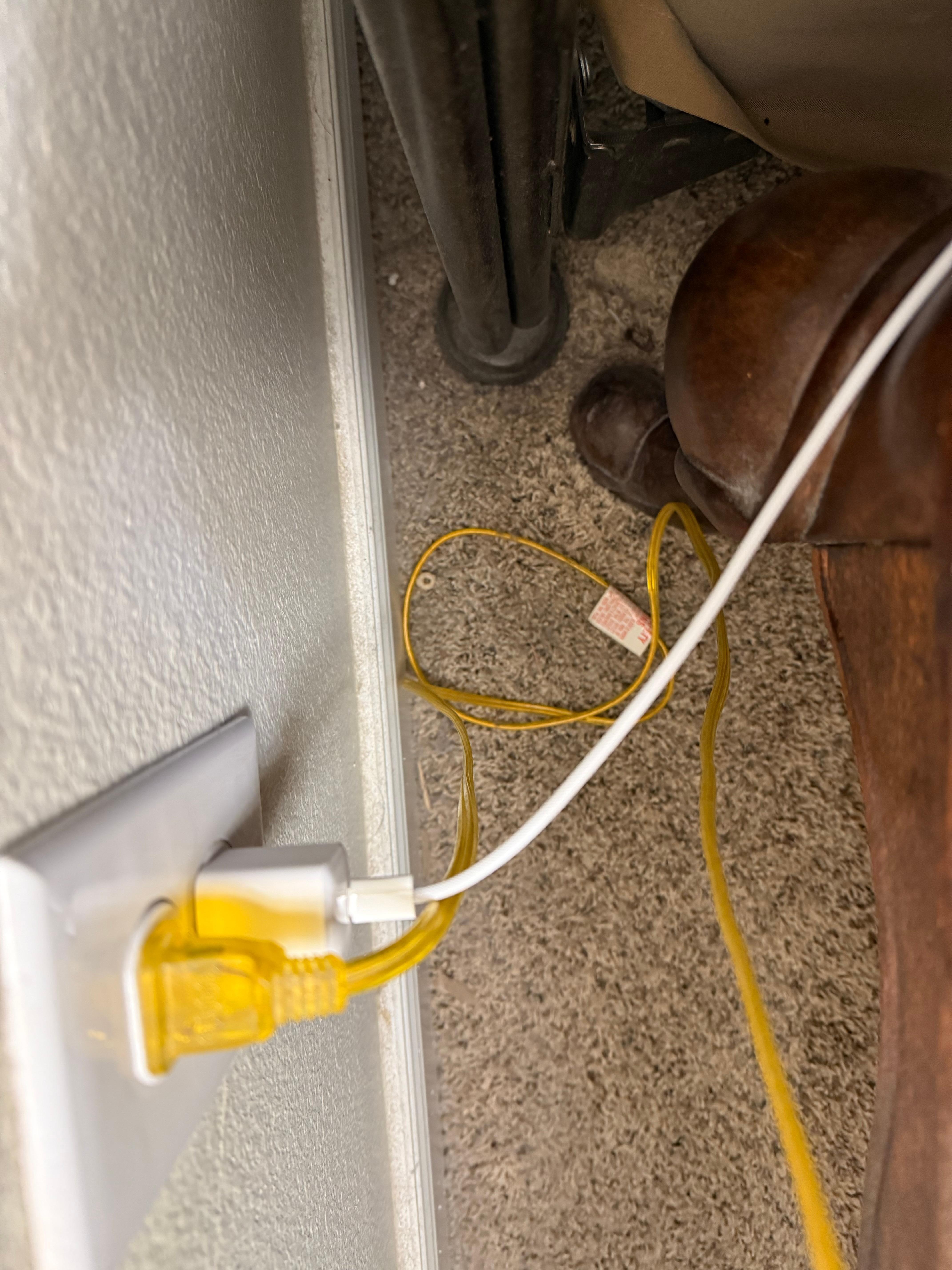 Behind nightstand. Dust, dirt and food.