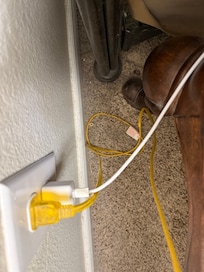 Behind nightstand. Dust, dirt and food.