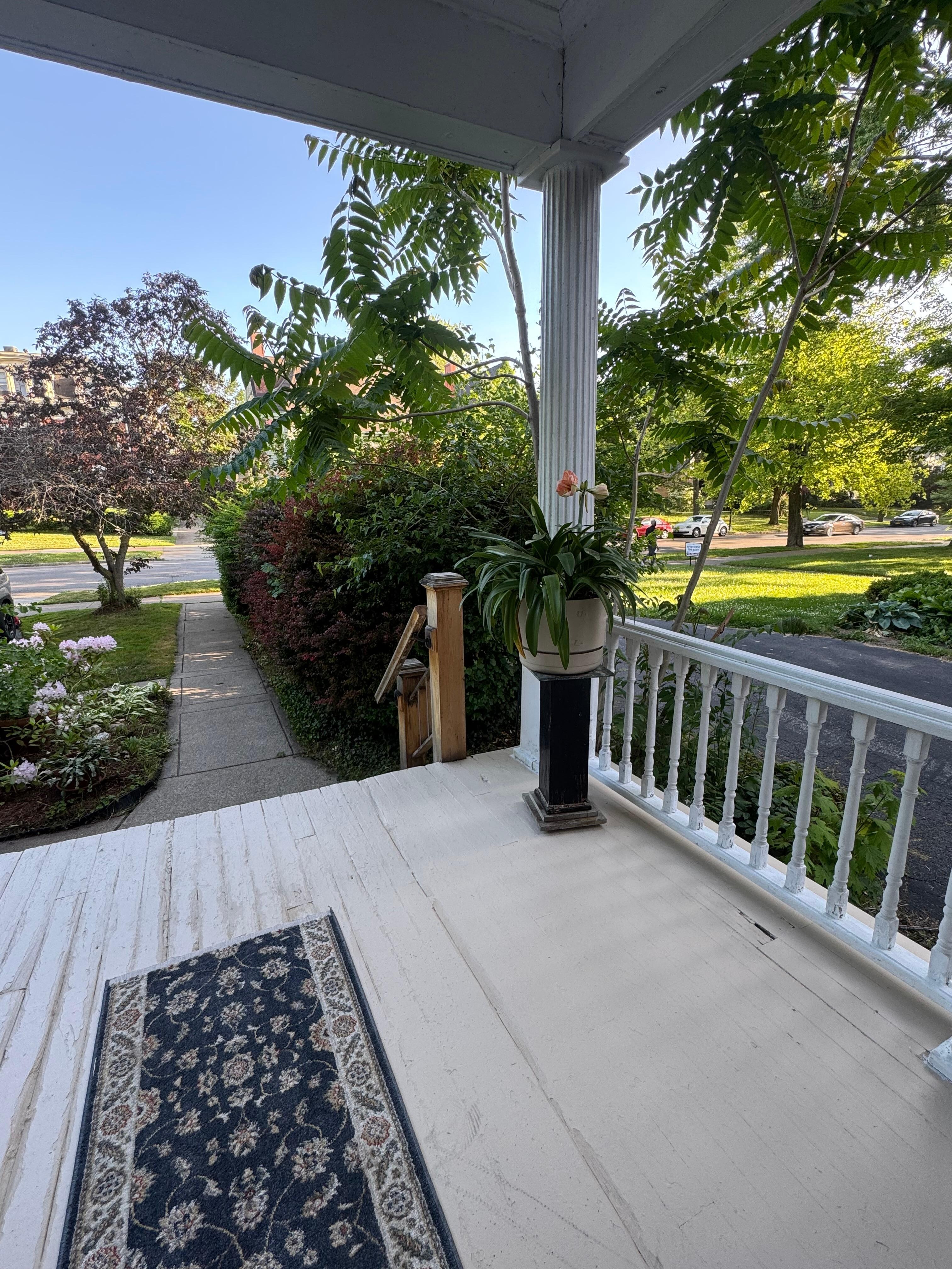 Front porch that was great to enjoy the quiet neighborhood