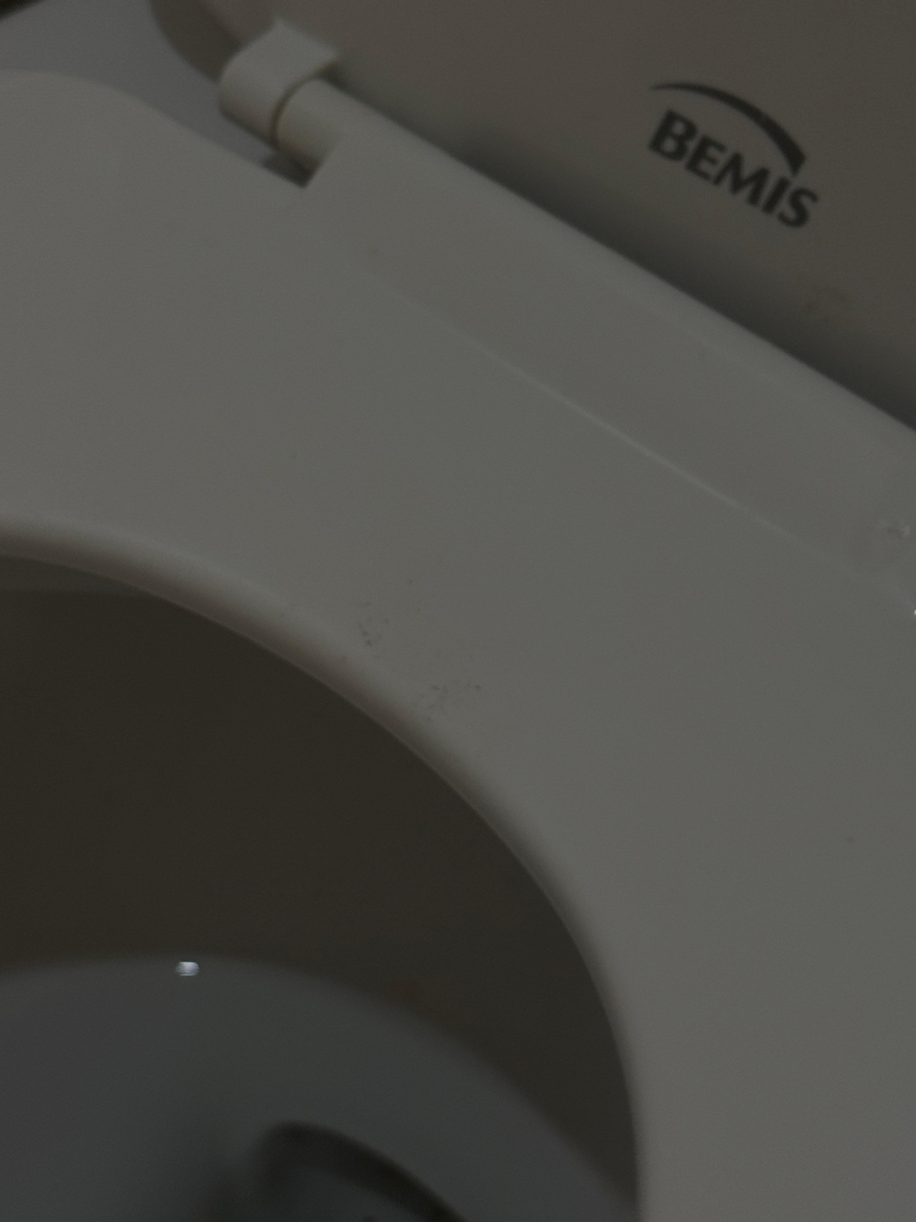 Marks on the back of toilet there after first arriving to the hotel room. They wiped off.