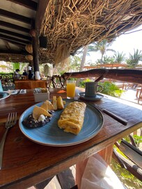 Breakfast included – omelette & beans