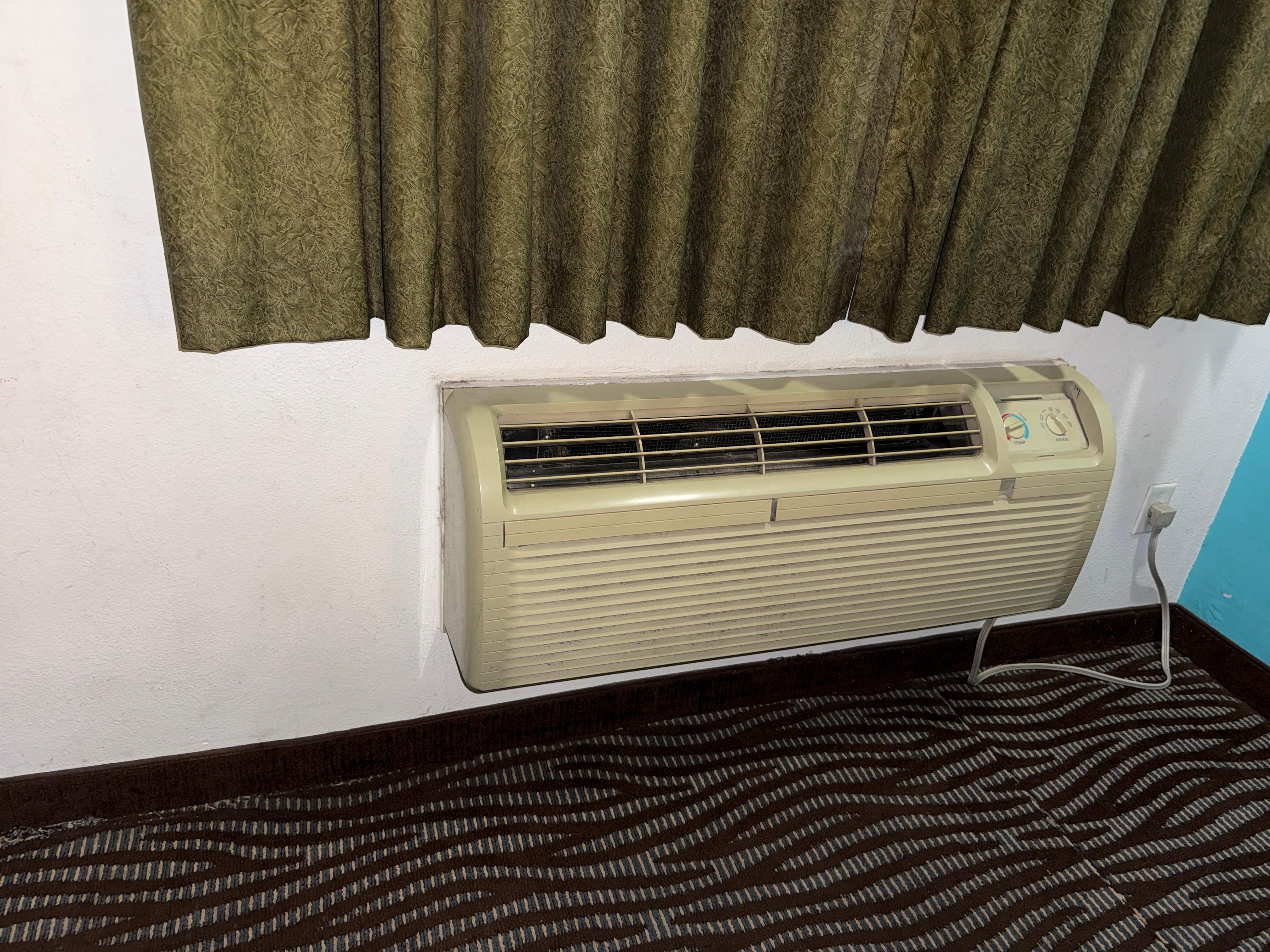 Dated, broken and filthy air unit