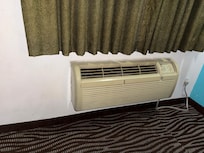 Dated, broken and filthy air unit