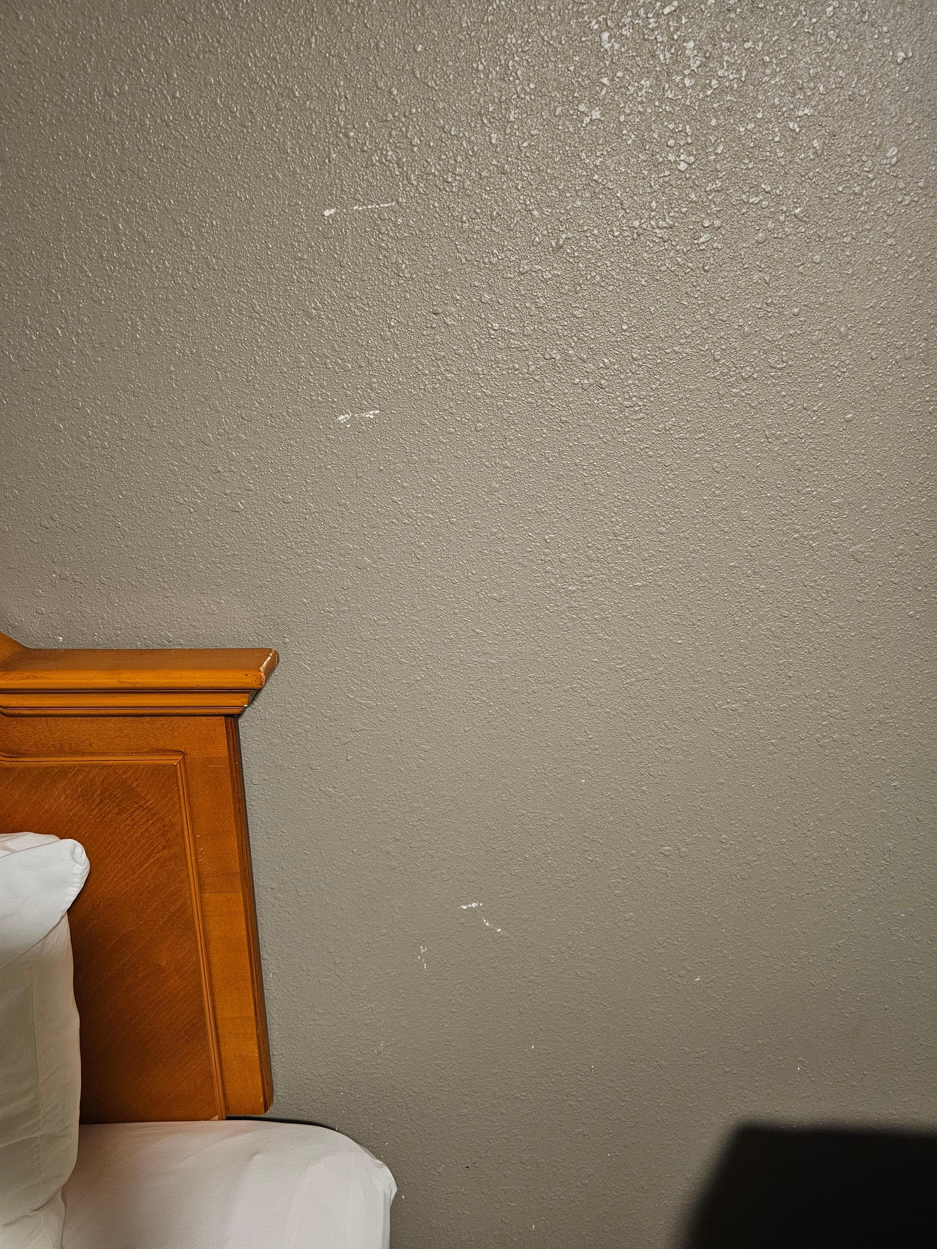 Scratches and dents on the wall