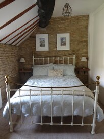 Super comfy bed, I love the sloped floors beside the bed, you know it's old when...