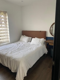 Master bedroom has an ensuite bathroom which has a better shower than the main bathroom.