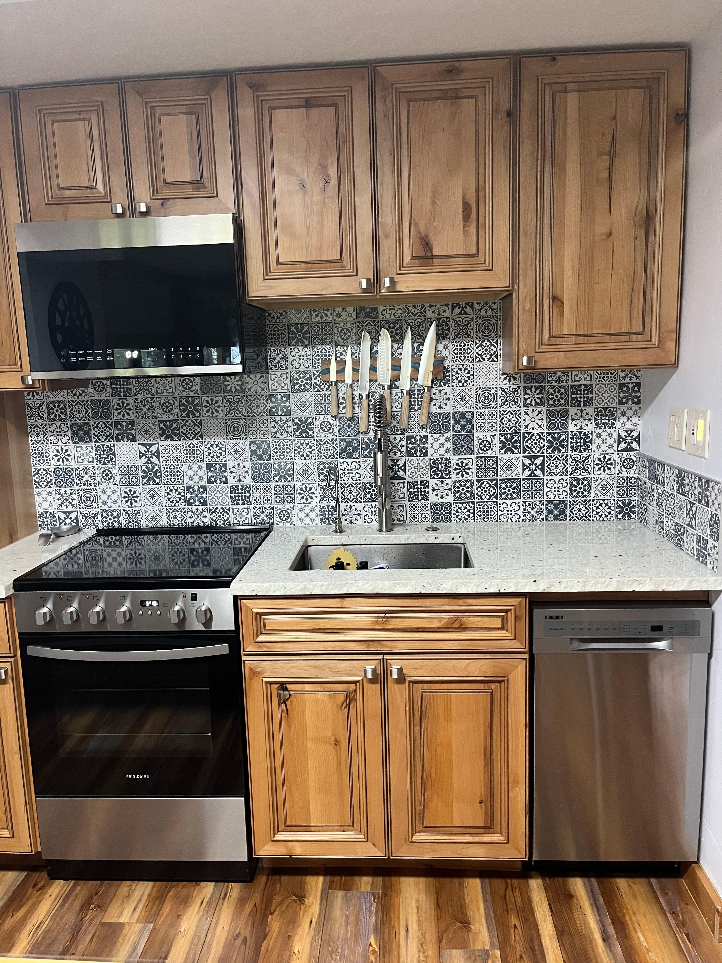Tile design for kitchen and bath are beautiful and fun!