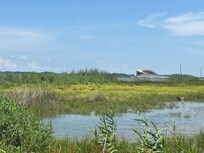 The bridge to middle Hooper’s Island from beach.