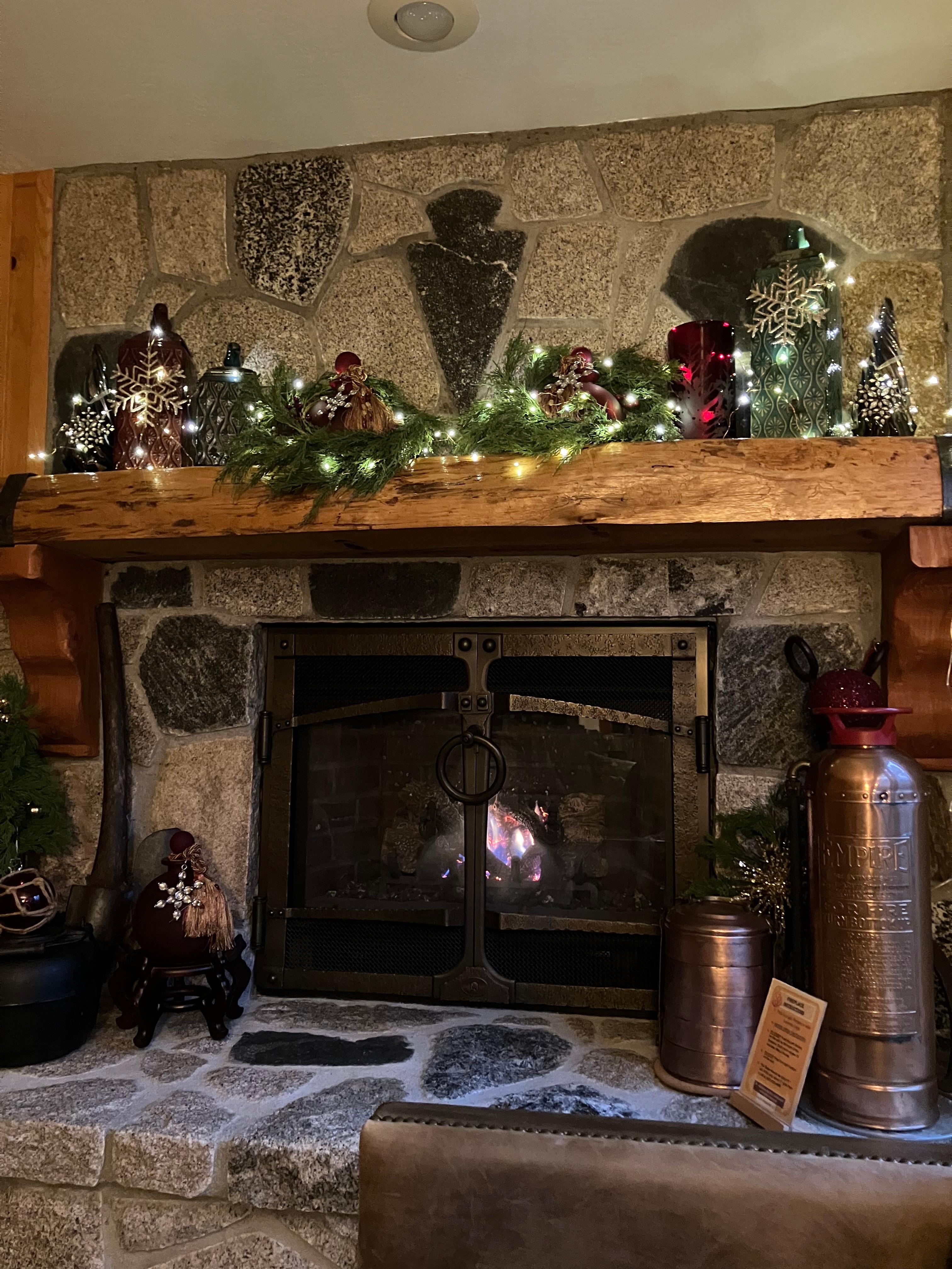 Loved the lights on the mantle above the cozy fireplace!